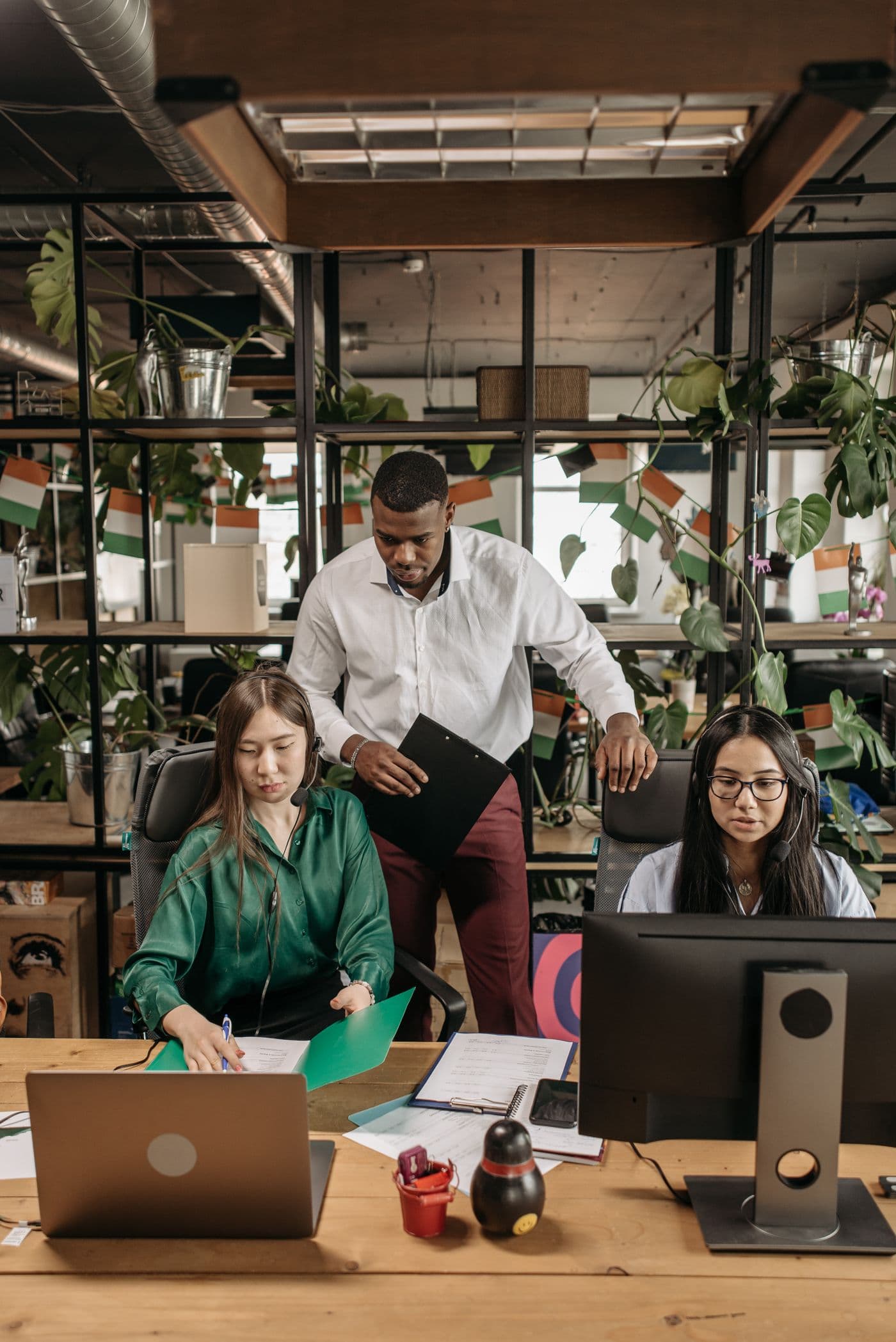 A Credit Union team collaborating in the office
